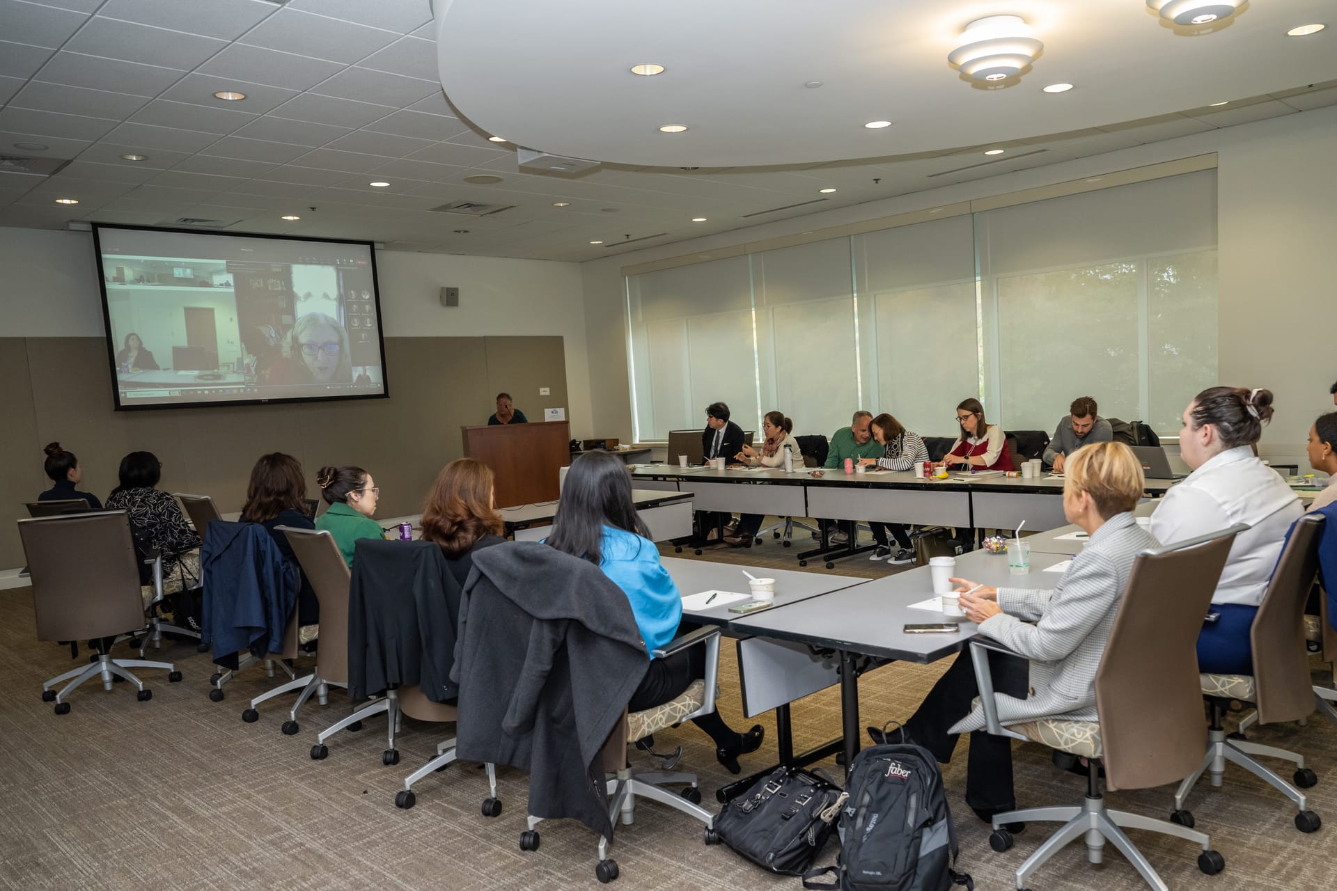 Faber employees listening to a presentation